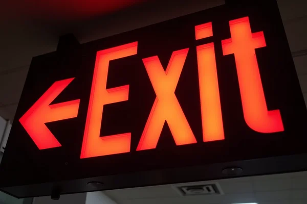 Emergency EXIT LED sign lighting system installation with backup power integration for commercial safety