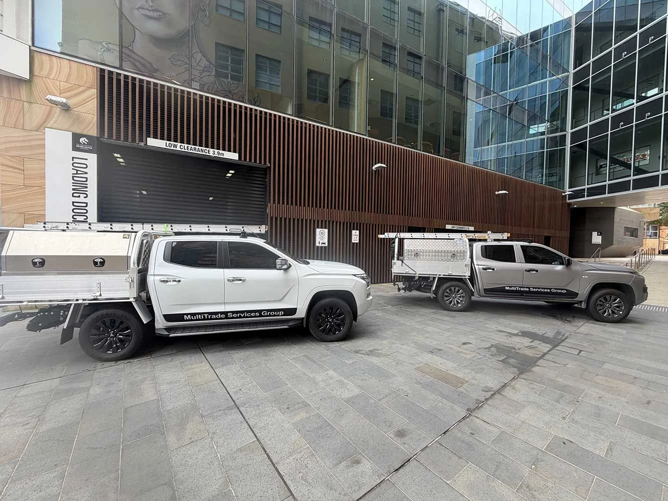 MTS Group fleet — branded utes ready for commercial and residential renovation work