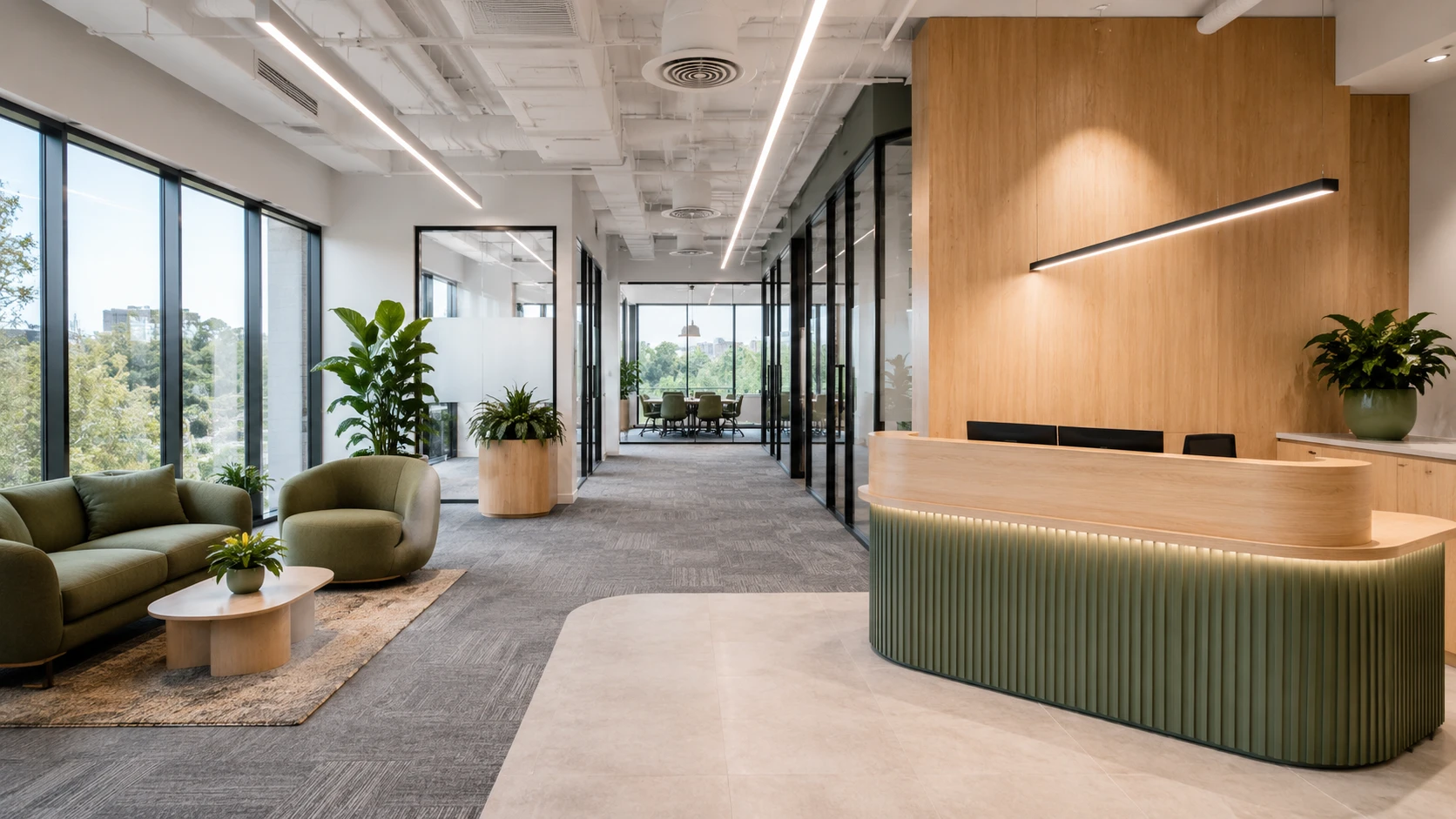 Office reception fitout with a curved timber reception desk and feature timber wall